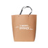 A large brown boutique paper bag with black handles and a logo on the front.
