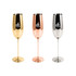 Three stainless steel champagne flutes in gold, rose gold, and silver, each with a logo on the front.