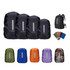 A set of reflective backpack rain covers in various colours, including black, green, orange, purple, and camouflage.