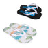 A pair of black thongs with white straps and a pair of flip-flops featuring a green leafy design and white straps.