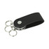 A black PU leather swivel drive with three metal keyrings attached.