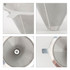 A stainless steel coffee filter with a mesh design, featuring a handle and a conical shape. It has a shiny metallic finish.