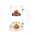 A beer glass with a pumpkin spinner toy inside. The glass is clear with a Halloween-themed design outside.