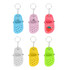 A collection of six classic clog shoe keyrings in blue, pink, white, yellow, and green, featuring a strawberry design.