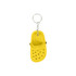 A yellow clog shoe keyring featuring ventilation holes and a metal chain attachment.