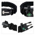 A black paracord bracelet featuring a compass and multiple attachment points. It has a strong, durable design.