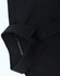 A black cotton blend long-sleeve shirt with a collar and button details, featuring a logo tag.