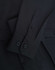 A black ladies' shirt featuring long sleeves and button details, showcasing a cotton blend fabric.