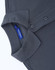 A grey short-sleeve polo shirt made of cotton and polyester, featuring a collar and button placket, with a logo.