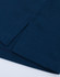 A close-up of a navy ultrafine cotton pique polo, featuring textured fabric and clean hems.