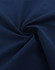 A close-up of navy fabric with a smooth texture, featuring a spiral pattern. The fabric appears high-quality and lightweight.