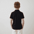 A black youth polo shirt viewed from the back. The shirt features short sleeves and a collar.