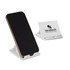 A white phone stand with a smartphone propped up, featuring a logo on one side.