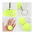 A tennis ball keyring in bright yellow, featuring a silver metal chain and ring. Three images display different angles and sizes.