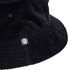 A black corduroy bucket hat featuring a logo on the side. The texture is clearly visible.