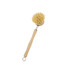 A long-handled wooden cleaning scrubber with a round, bristled head and a metal loop at the end of the handle.