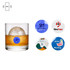 A drink glass containing a large ice cube, accompanied by four colourful NFC custom PET stickers.