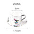 A ceramic coffee mug with a vibrant hummingbird design, silver handle, and matching saucer, measuring 250ML.