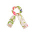 A long scarf in a twill weave featuring a floral design in shades of pink, green, and yellow, with a branding logo.