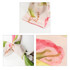 A Twill Weave Long Scarf featuring floral patterns in pink and green hues, with a subtle logo visible.