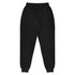 Black tapered fleece kids pants with an elastic waistband and cuffed hems. Features pockets and a brand logo.