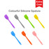 A collection of colourful silicone spatulas in purple, grey, green, yellow, orange, and pink, featuring a logo.