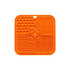 An orange, four-section silicone lick mat with various textures, including paw prints and bone shapes.