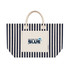 A striped tote bag in navy and cream with a front pocket and a branded logo.