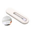A white smartphone strap with a sliding mechanism, featuring a circular button and an opening to attach to devices.