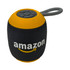 A round Bluetooth speaker in black and orange with a grey strap and a logo on the front.