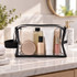 A clear cosmetic bag contains various skincare products, including bottles and tubes, with a black trim.