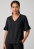 A black fluted sleeve blouse with a V-neckline, displayed on a model against a neutral background.