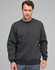 A dark grey crew fleece sweatshirt featuring a round neck and ribbed cuffs, modelled by a man.