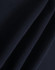 A close-up of dark navy polar fleece fabric showing soft, smooth texture folds. It features a branding logo.