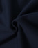 A close-up of soft navy fabric, showcasing the texture and quality of the material.