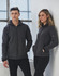 A black heather bonded fleece jacket displayed on models, featuring a zip front and pockets.