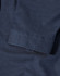 A navy blue button-up shirt featuring a pin dot pattern and 3/4 sleeves, with a folded cuff detail.