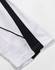 A white polo shirt featuring black detailing along the sleeves and a logo.
