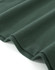 A close-up of a dark green cotton stretch polo shirt, showcasing the fabric's texture and the hem.