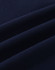 A close-up of navy cotton fabric with visible stretch and texture, ideal for polo shirts.