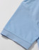 A light blue polo shirt sleeve featuring a smooth finish and a logo on the front.
