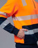 An orange and navy work jumper featuring reflective stripes and a front pocket. Includes a partial zip at the collar.