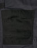 A close-up of black utility cargo work pants featuring a large pocket on the thigh area.