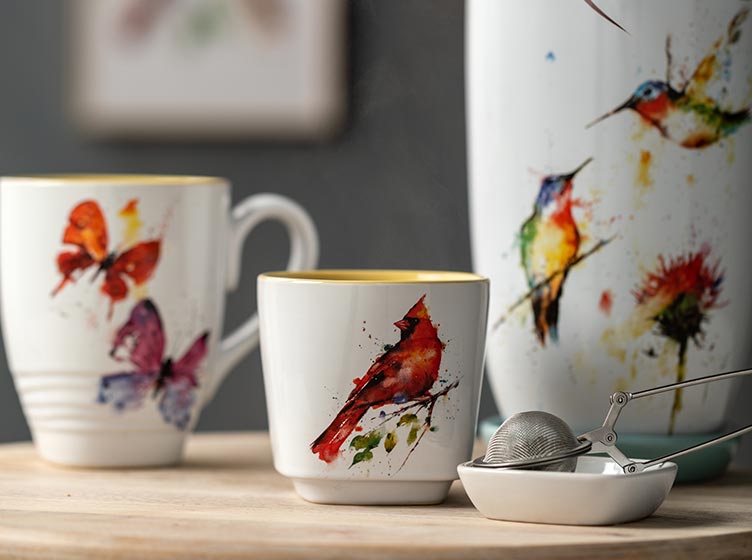 md-dean-crouser.jpg Ceramic mug and pots decorated in watercolor birds.