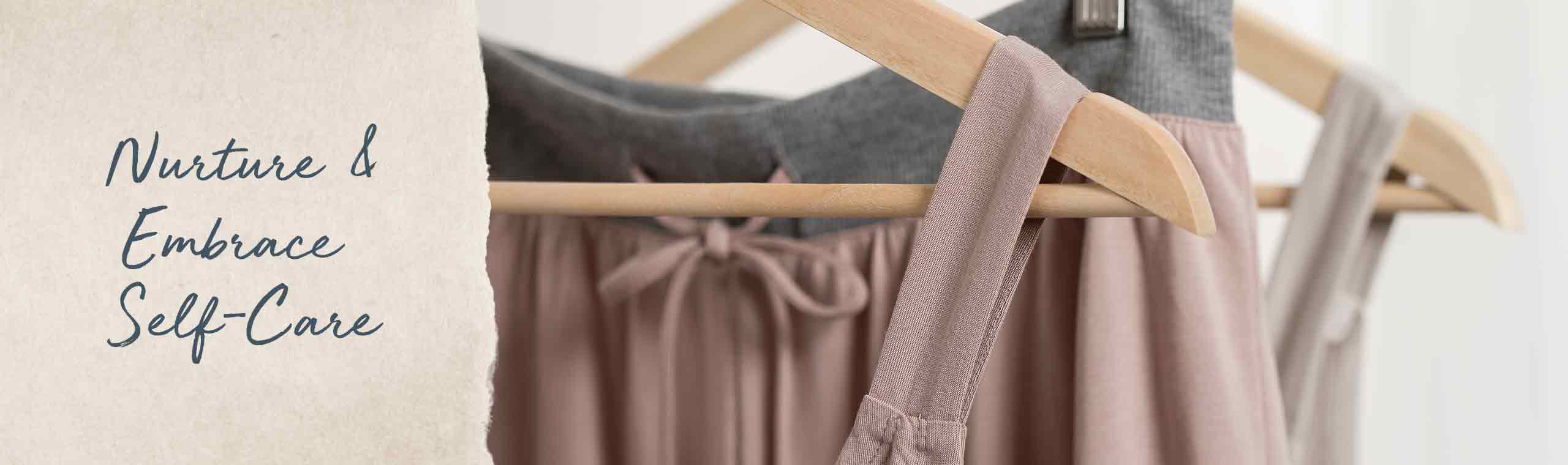 Nurture and Embrace Self-Care comfortable apparel hanging on a rack