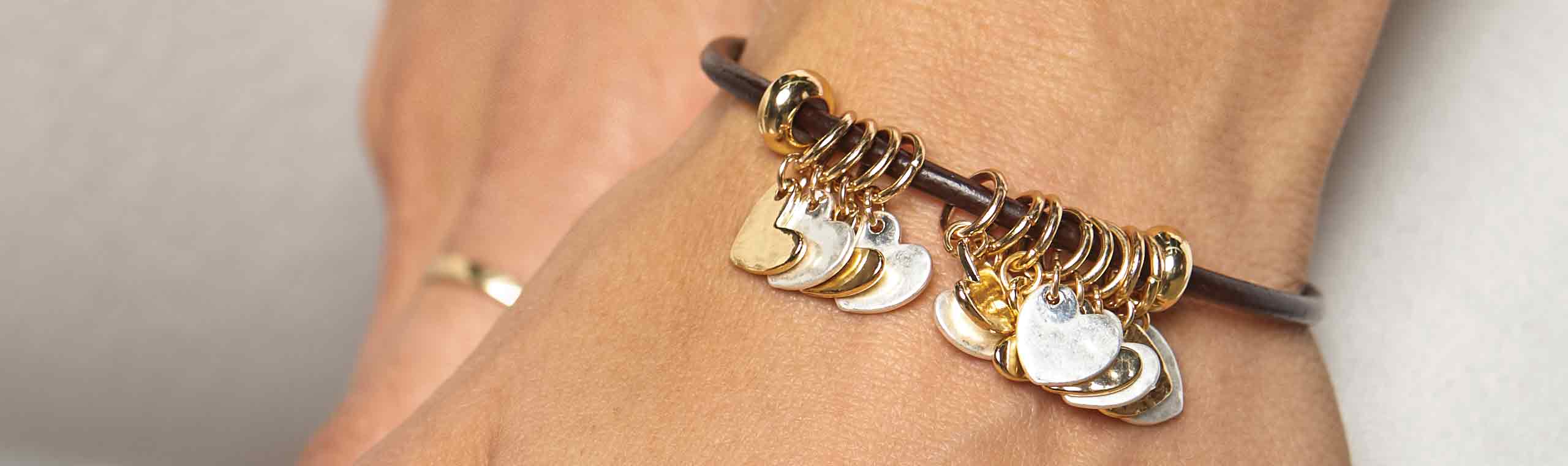 A bracelet with heart shaped tokens