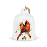 A white bell with two watercolor cardinals on the front.