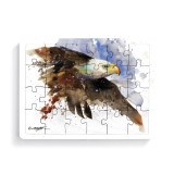 A 24 piece postcard puzzle with a watercolor image of a bald eagle in flight.