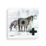 A square wood tic tac toe board with a watercolor image of three horses, with a gray O and black X on top.