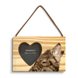 A rectangular wood hanging ornament with a heart shaped 2 inch photo opening next to an image of a howling wolf.